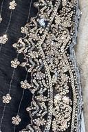 Black embroidered kurta, close up of the scalloped silver sequin and bead border