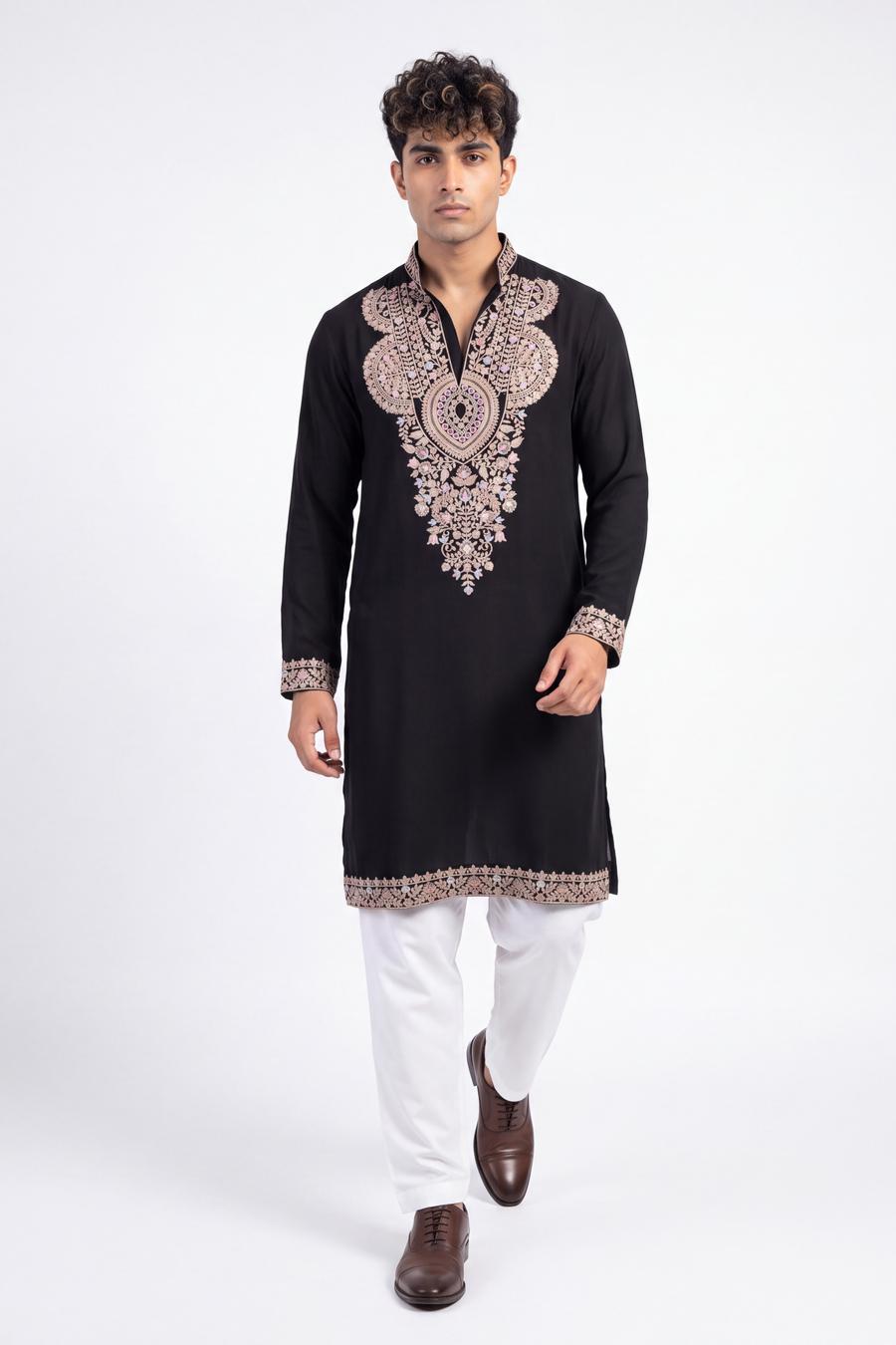Black open neck kurta in motion, showing the gold embroidered hem band and cuffs