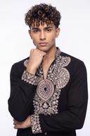 Black open neck kurta, waist up, antique gold medallions and embroidered placket with silver sequins