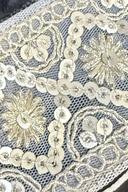 Farshi lehenga, close up of the ivory and gold sequin sunburst embroidery on net