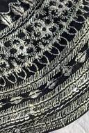 Black long shirt, close up of silver thread stripes and floral medallions