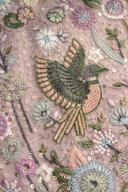 Close up of the blush pink kurta embroidery: perched birds, leaves and florals with flat sequins