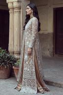 Champagne embroidered peshwas, full length side view showing the flare of the skirt