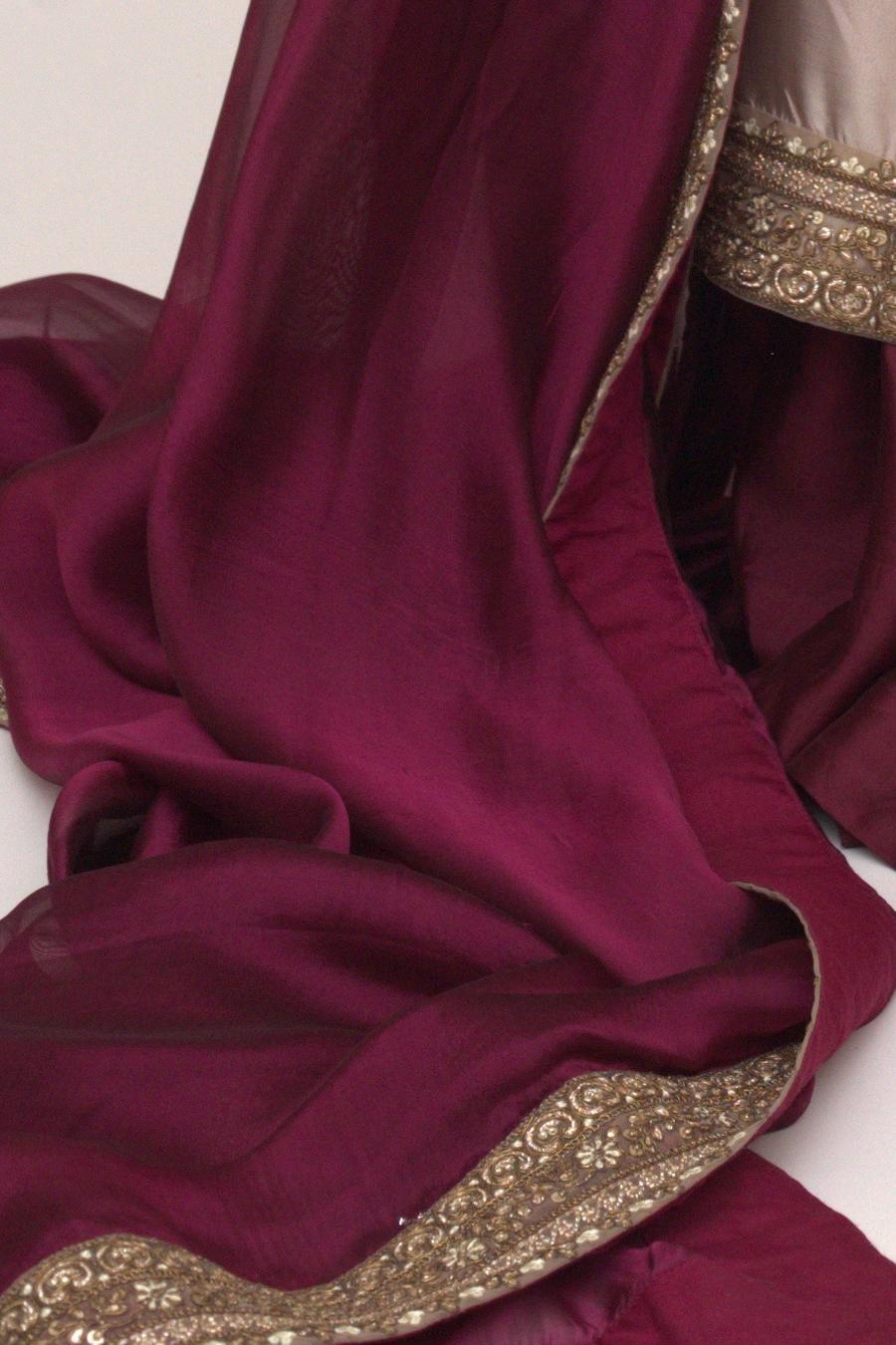 Maroon dupatta, close up of the sheer drape and gold embroidered border