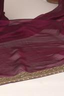 Champagne long shirt, close up of the maroon dupatta's gold embroidered border