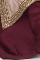Champagne long shirt, close up of the gold embroidered neckline border on maroon