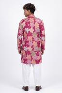 Back view of the fuchsia silk kurta showing the all-over floral pattern down to the hem