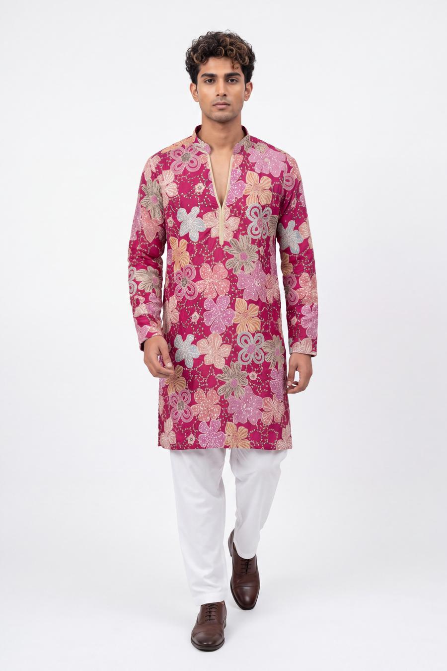 Fuchsia silk kurta with white shalwar in motion, floral pattern running to the wrist
