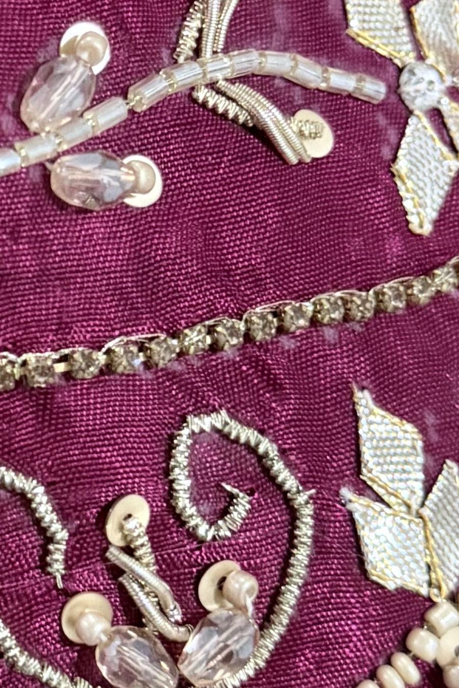 Red hand embroidered trousers, close up of pearl beads, silver bugle leaves and sequin scrolls