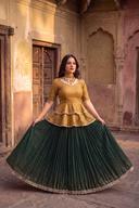 Green Lehenga and Gold Shirt, front view. Available to rent from Wear Wali.