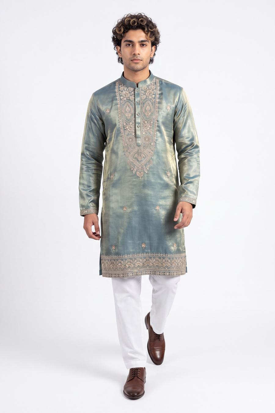 Green tissue silk kurta in motion, showing the teal to gold green sheen and side slits