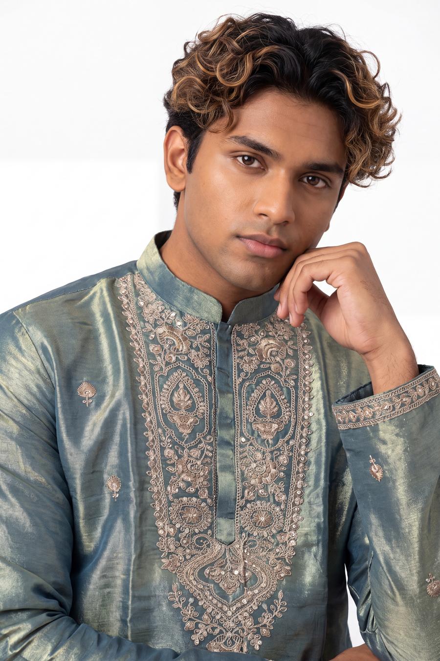 Green tissue silk kurta, waist up, buttoned mandarin collar with paisley embroidery either side