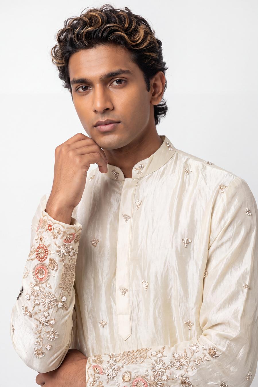 Ivory kurta, waist up, closed rounded collar and buttoned placket with white bead motifs