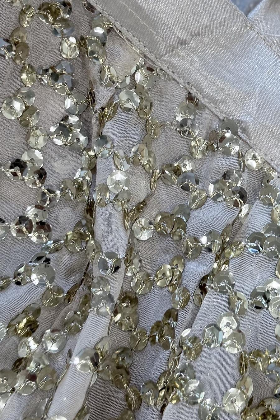 Ivory sequin lehenga, close up of the silver sequin lattice at the waistband