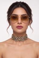 Model wearing the Wear Wali kundan polki collar choker in antique gold, oval medallions between polki florals