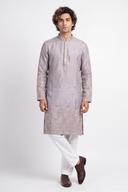 Lavender grey embroidered kurta with white shalwar, full length front view on a model