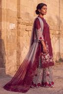 Maroon long shirt with gray palazzo, side view showing the scalloped sheer sleeve and the ombre dupatta trailing behind