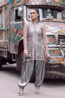 Silver jaali net jacket over velvet inner with metallic silver balloon pants, full length front view