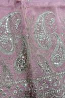 Macro close up of the metallic thread embroidery on the collar band of the pink tissue two tone men's kurta