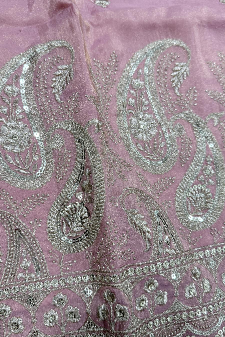 Macro close up of the metallic thread embroidery on the collar band of the pink tissue two tone men's kurta