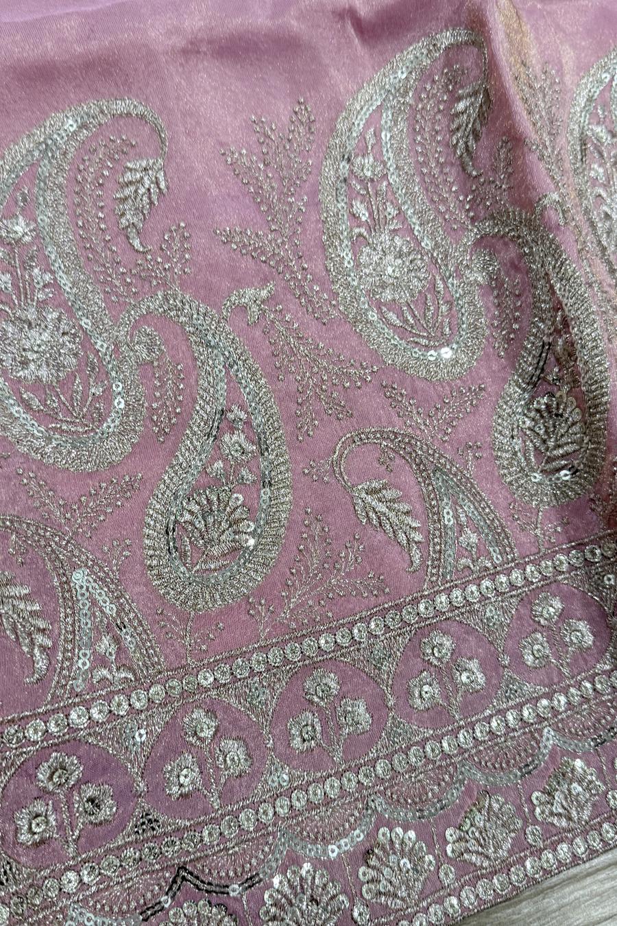 Macro close up of the embroidered placket and button detail on the pink tissue two tone men's kurta