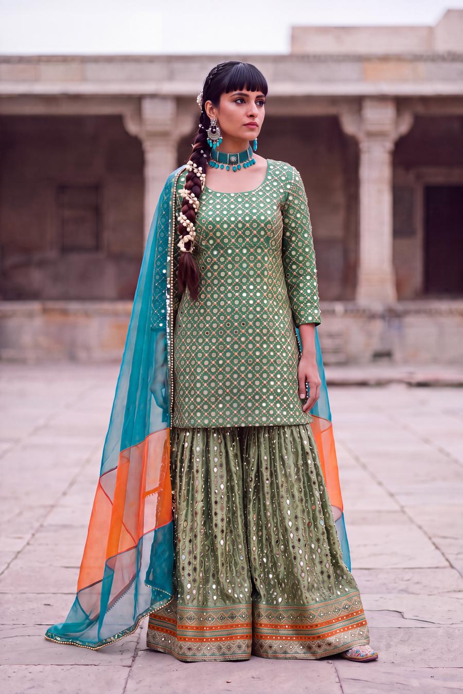 Pistachio mirror work sharara with teal and orange organza dupatta, full length front view