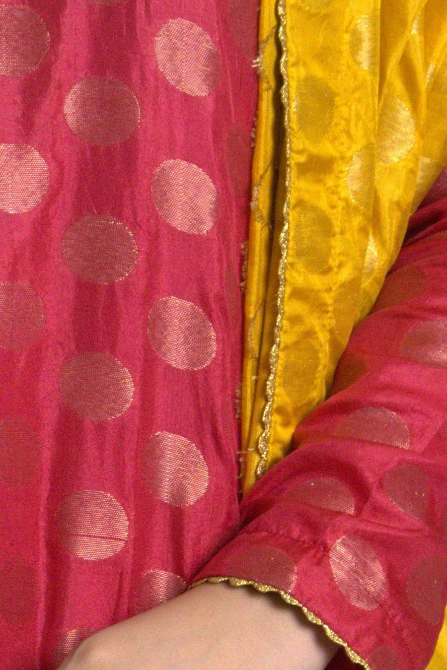 Red gold dot long shirt, close up of the gold woven dots beside the mustard dupatta
