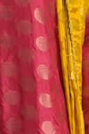 Red gold dot long shirt, close up of the woven gold dot pattern and mustard dupatta edge