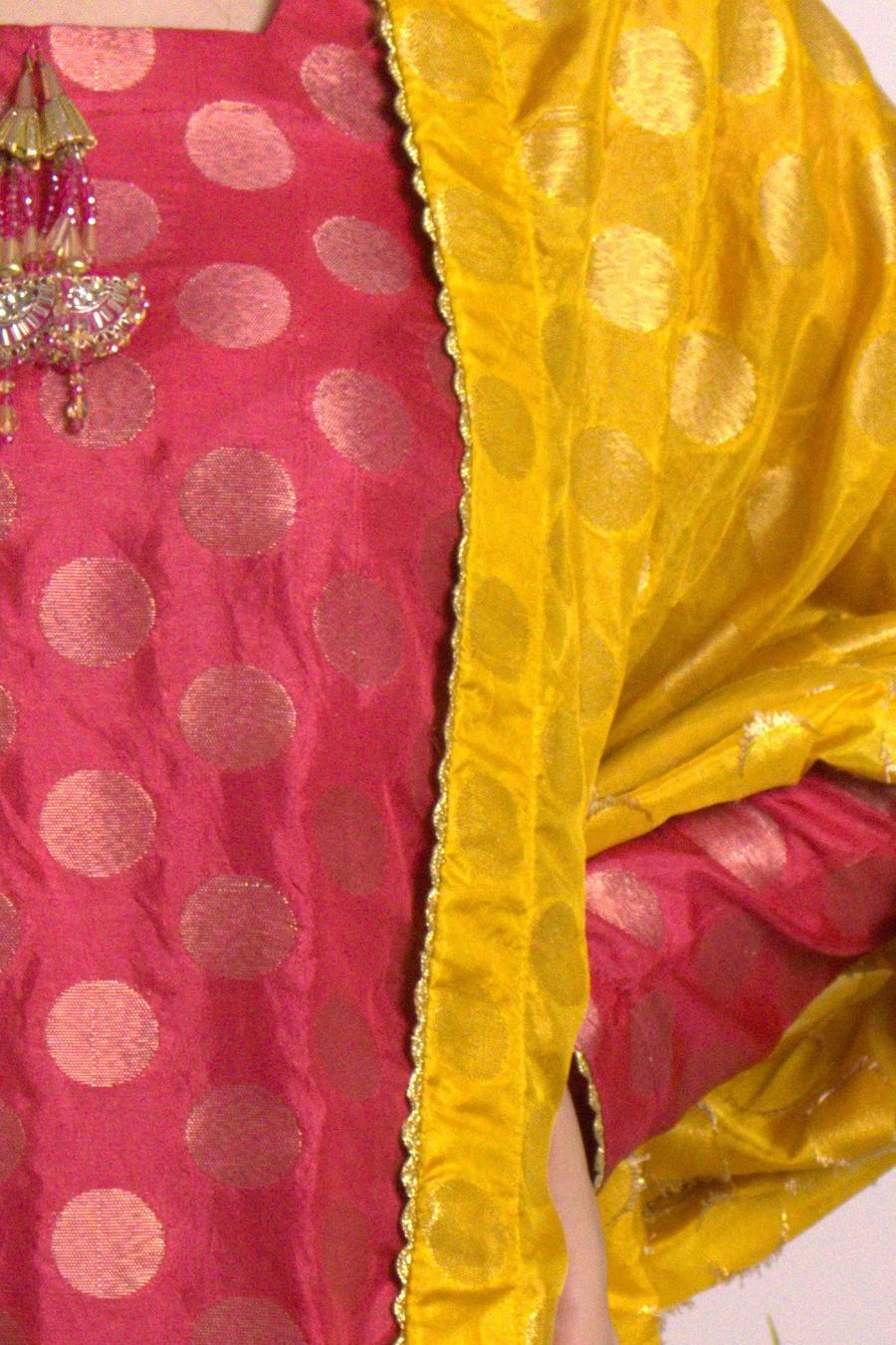 Red gold dot long shirt, close up with the mustard banarasi dupatta and tassel